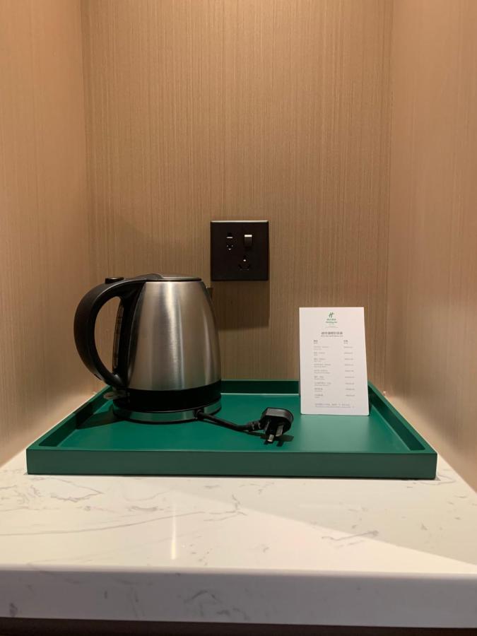 Holiday Inn Shanghai Nanjing Road By Ihg Exterior photo A kettle in a hotel room
