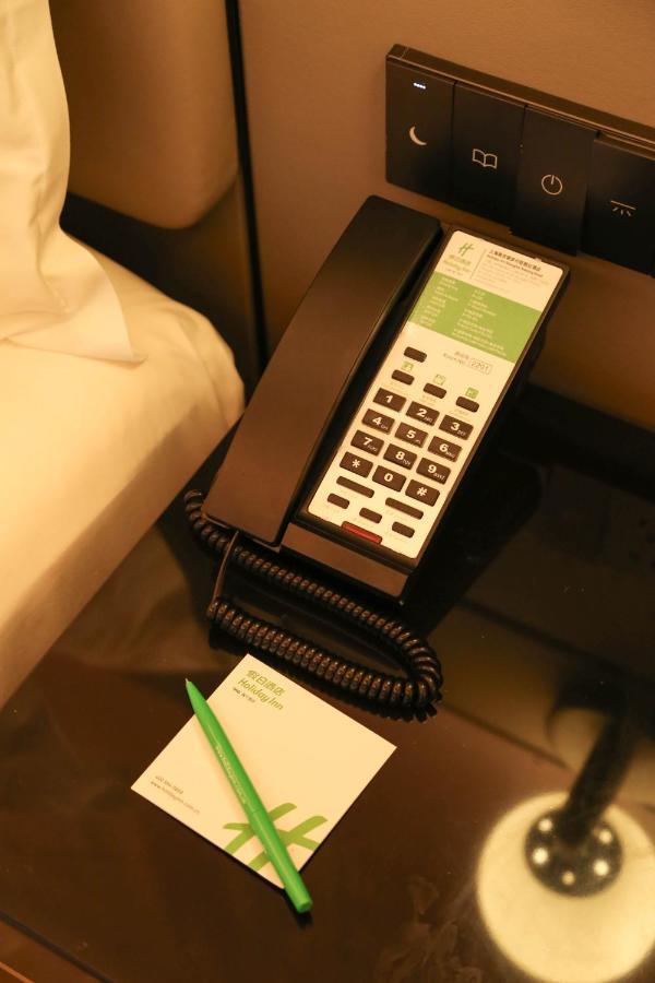 Holiday Inn Shanghai Nanjing Road By Ihg Exterior photo A telephone
