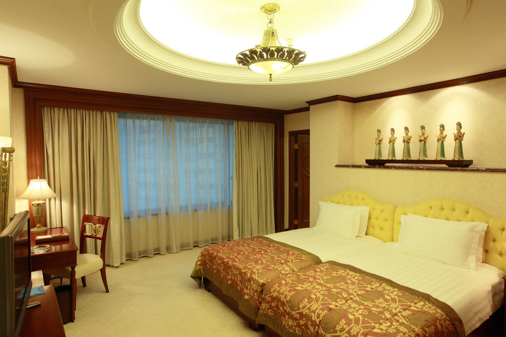 Holiday Inn Shanghai Nanjing Road By Ihg Exterior photo A room at the hotel
